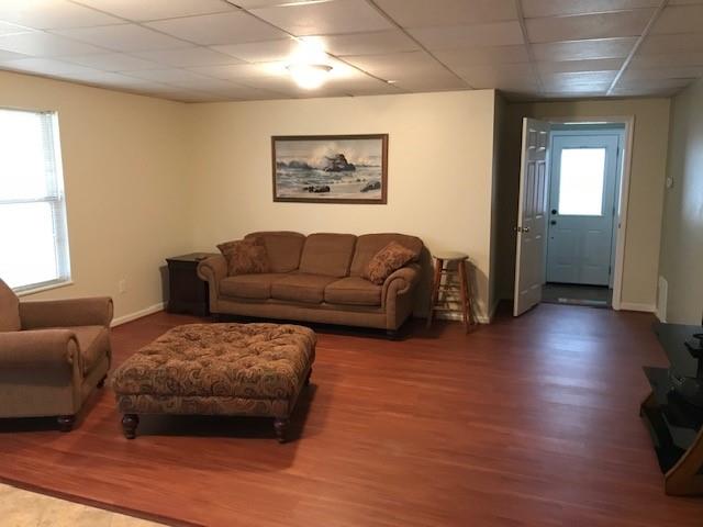 4086 Parks Road Flowery Branch, GA 30542 - Photo 16 of 23 a living room with furniture and a hard wood floor