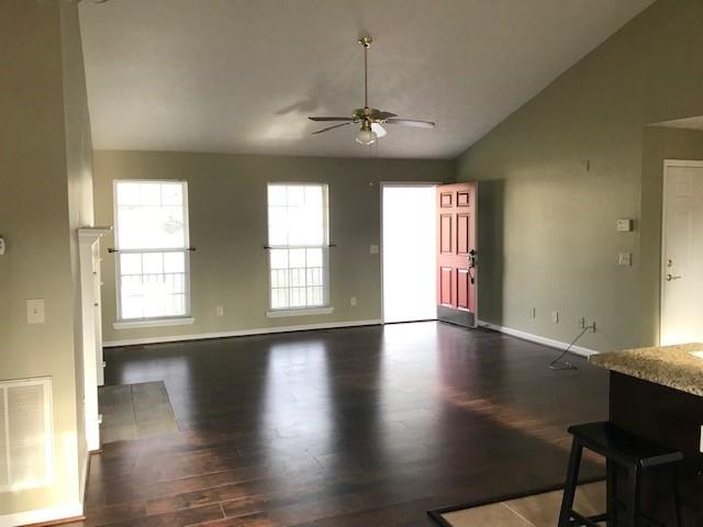 4086 Parks Road Flowery Branch, GA 30542 - Photo 3 of 23 an empty room with wooden floor and windows
