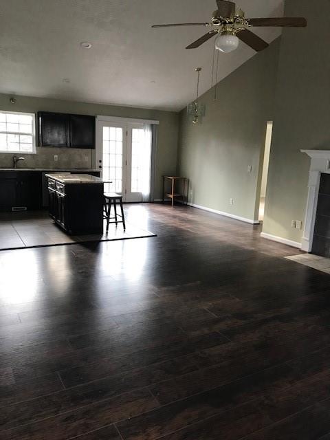 4086 Parks Road Flowery Branch, GA 30542 - Photo 5 of 23 an empty room with wooden floor and windows