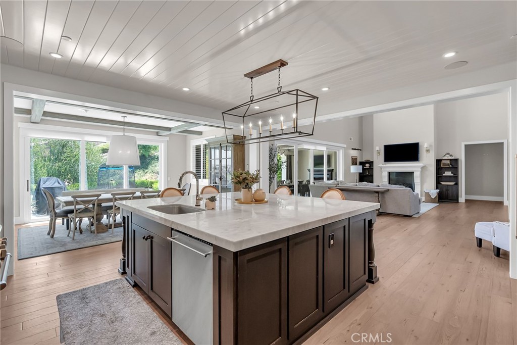12237 Cortona Place Riverside, CA 92503 - Photo 16 of 60 a room with lots of table and chairs