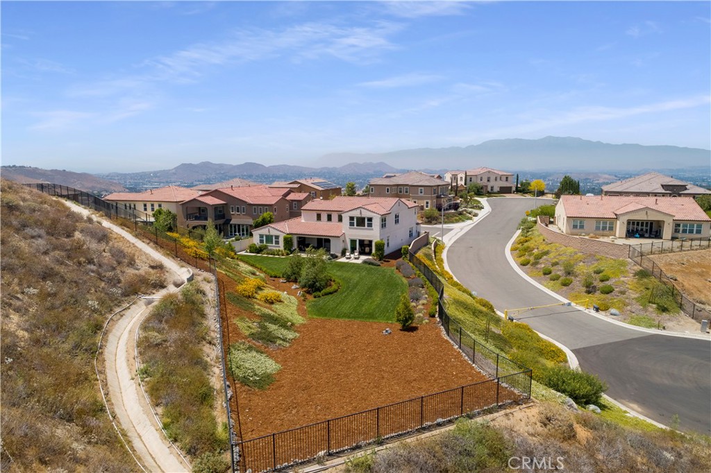 12237 Cortona Place Riverside, CA 92503 - Photo 38 of 60 an aerial view of a house