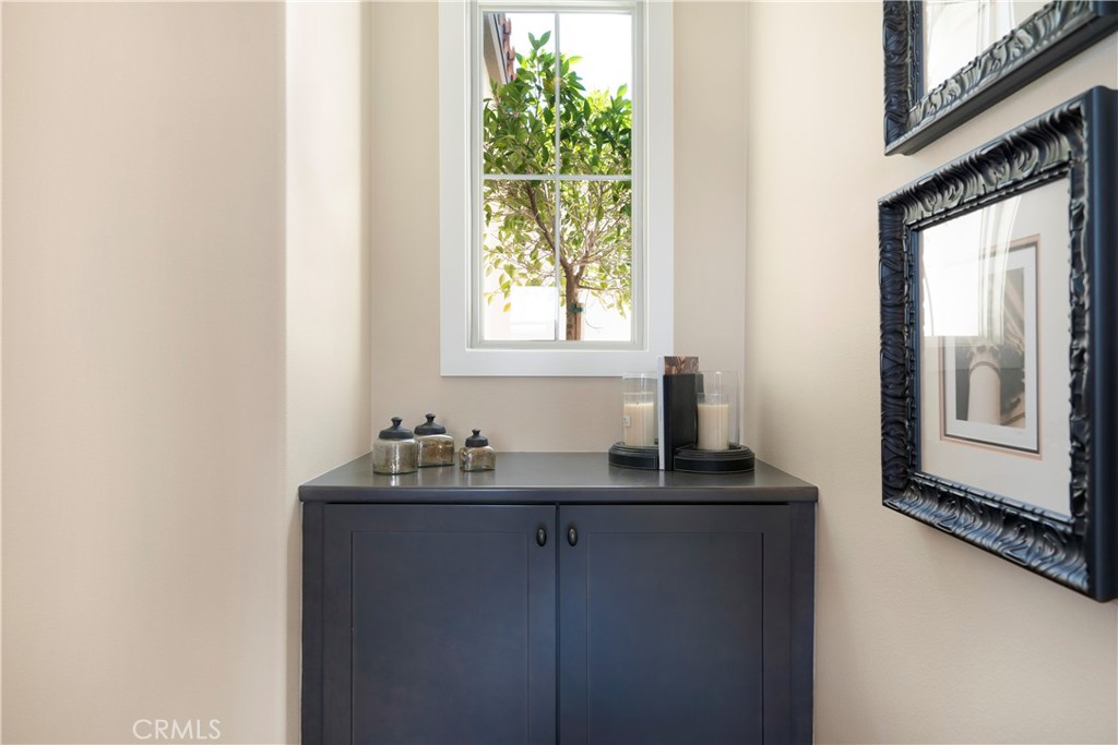 12237 Cortona Place Riverside, CA 92503 - Photo 39 of 60 a bathroom with a sink and a mirror