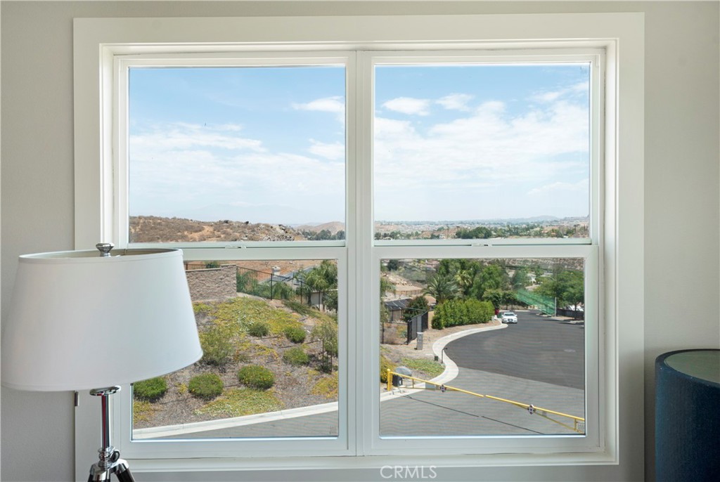 12237 Cortona Place Riverside, CA 92503 - Photo 44 of 60 a view of a glass door and a window