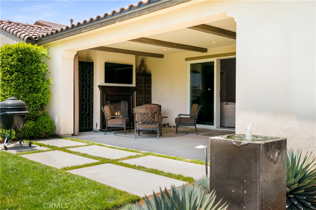 12237 Cortona Place Riverside, CA 92503 - Photo 47 of 60 a building outdoor space with patio furniture and potted plants