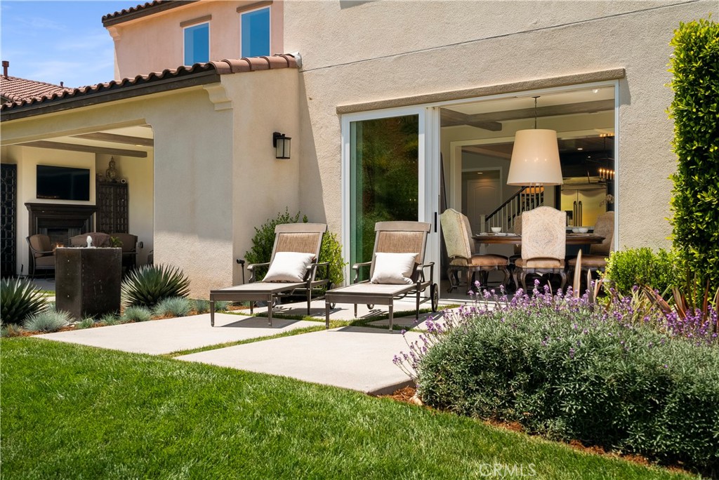 12237 Cortona Place Riverside, CA 92503 - Photo 55 of 60 a view of a house with backyard porch and sitting area