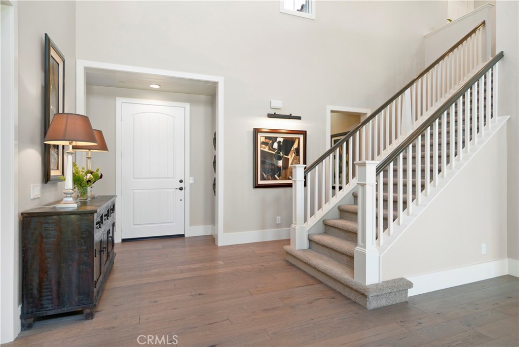 12237 Cortona Place Riverside, CA 92503 - Photo 10 of 60 a view of entryway and hall with wooden floor