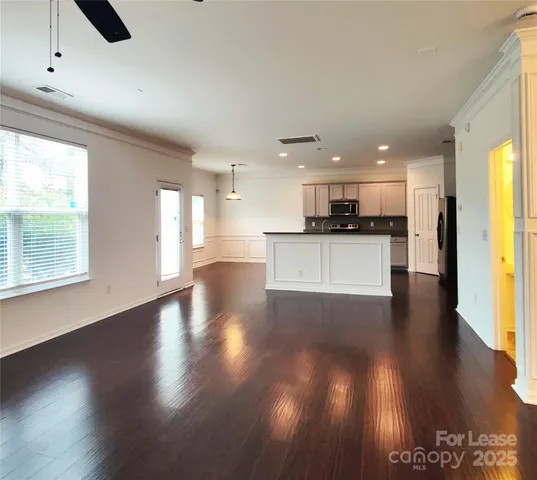 a view of a kitchen with a sink and a stove