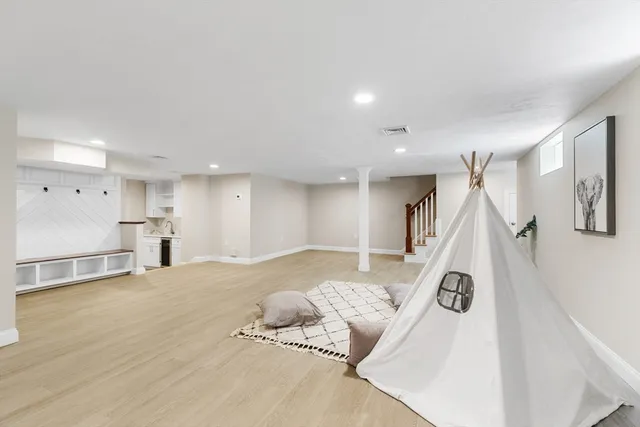 a view of a living room and a large window