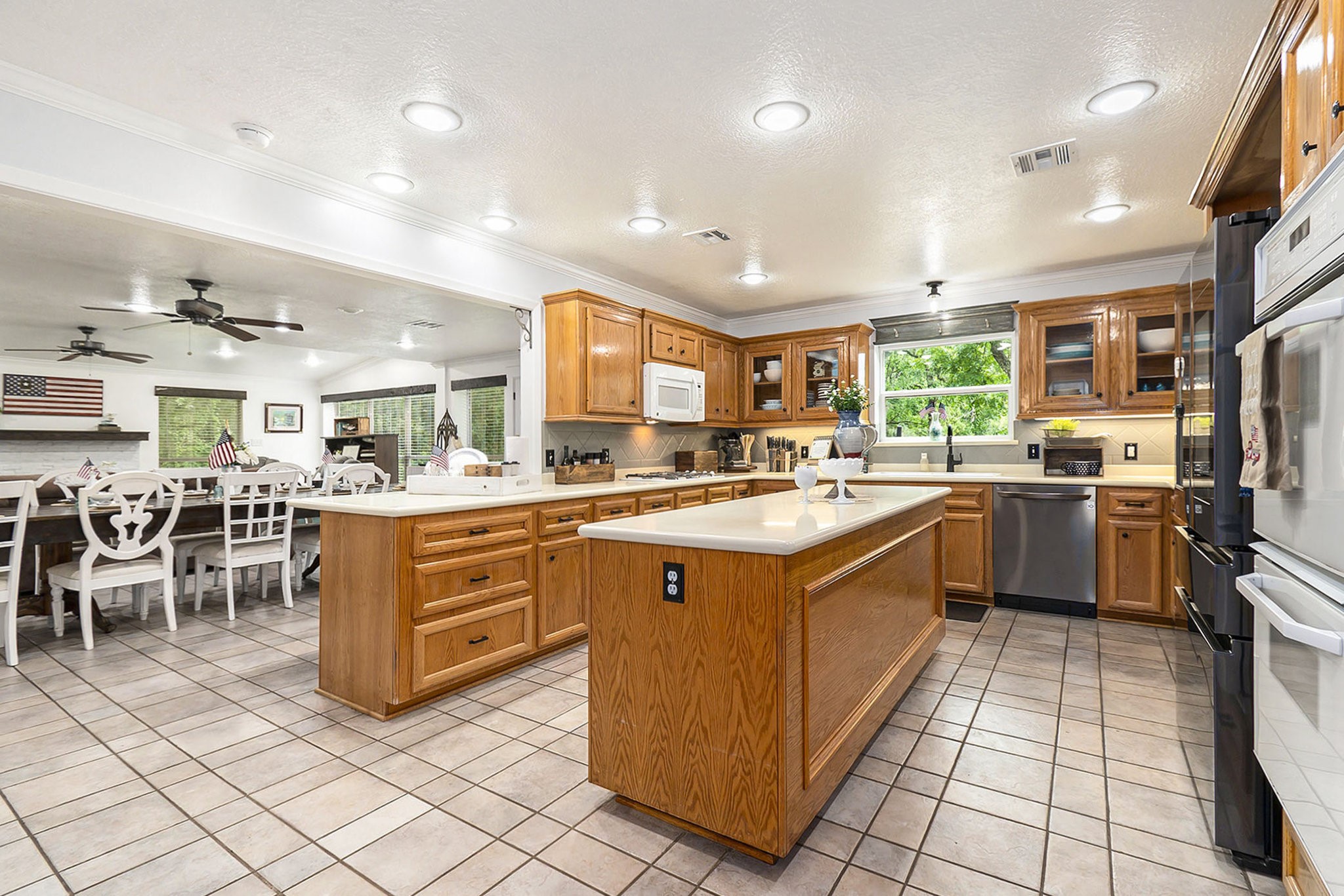 7363 County Line Road Willis, TX 77378 - Photo 10 of 34 Spacious kitchen island perfect for entertaining guests.