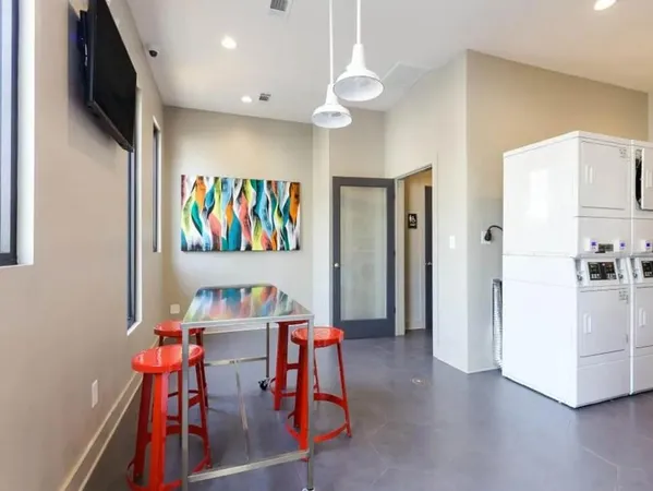 a view of a dining room with furniture