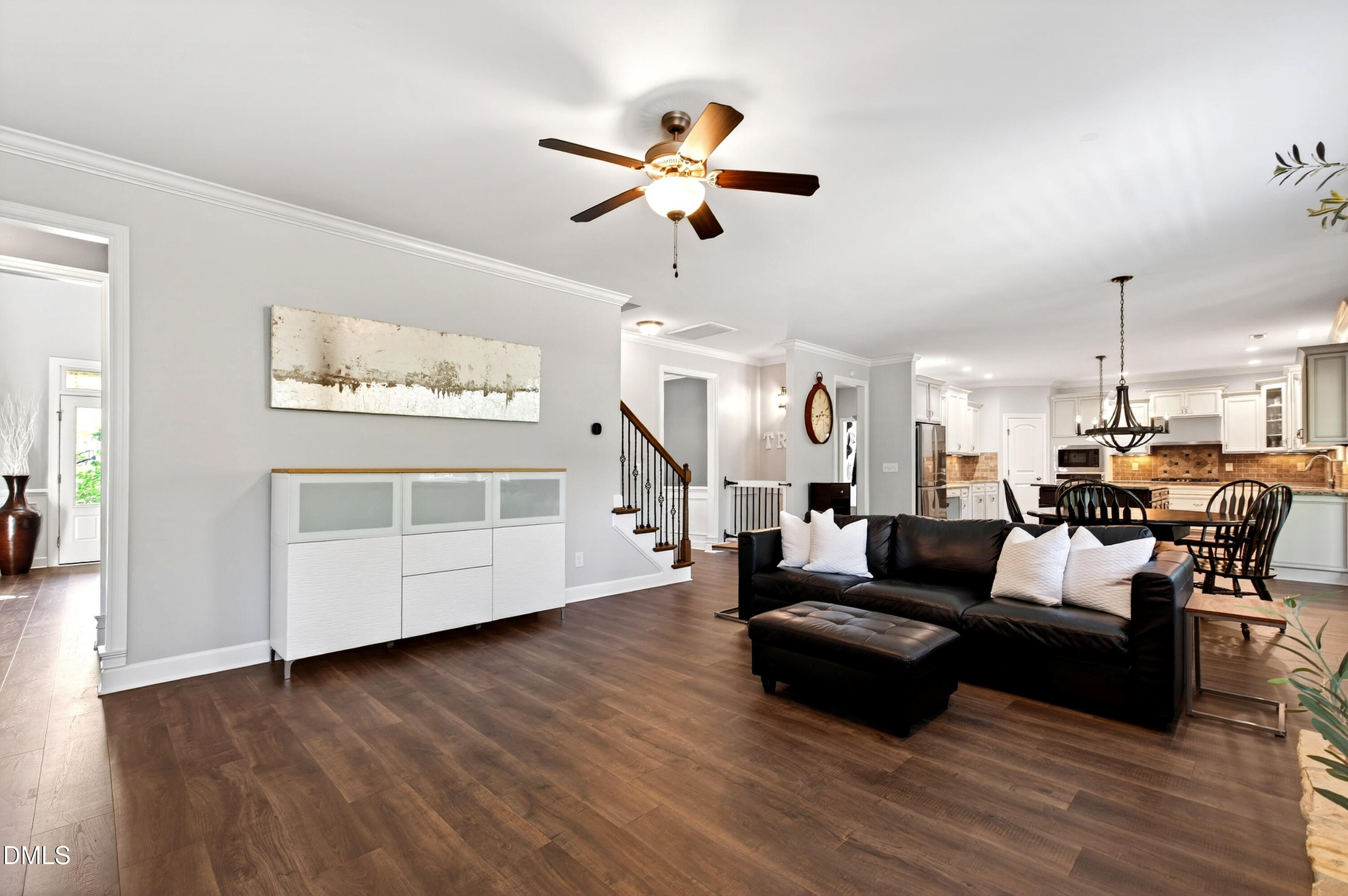 313 Karpen Lane Cary, NC 27519 - Photo 21 of 86 a living room with furniture and wooden floor
