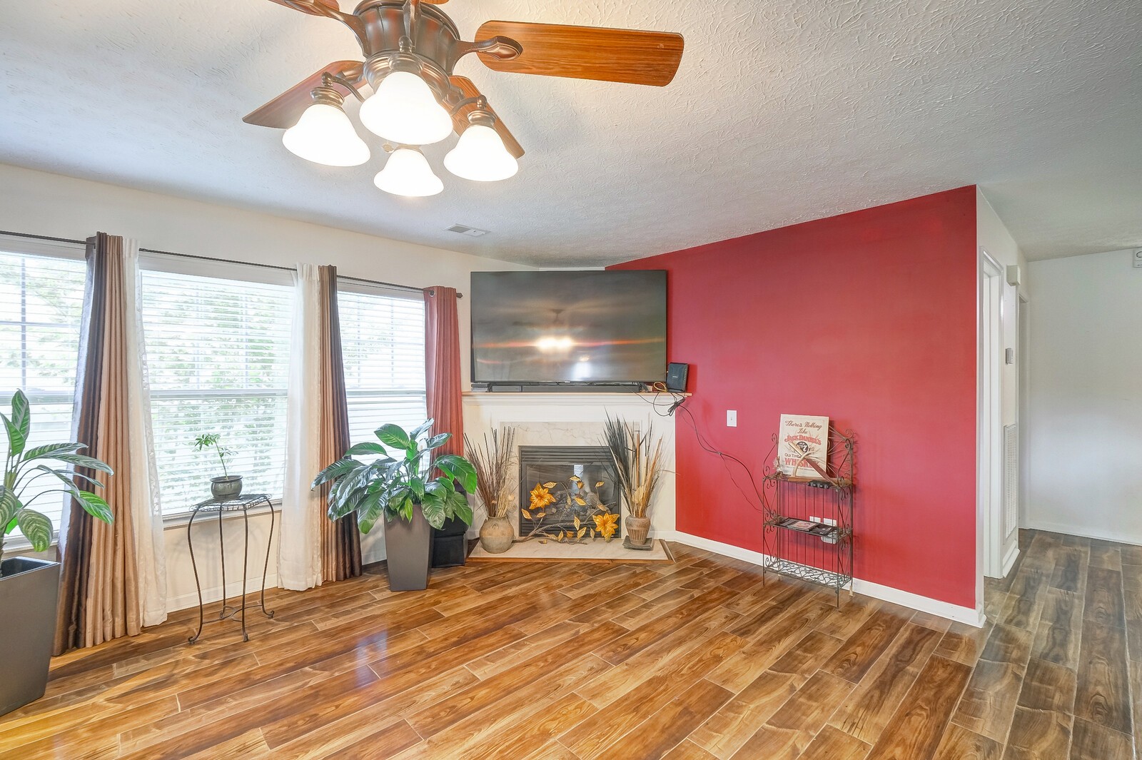 3904 Stephens Ridge Way Antioch, TN 37013 - Photo 8 of 17 a bedroom with a bed and a chandelier