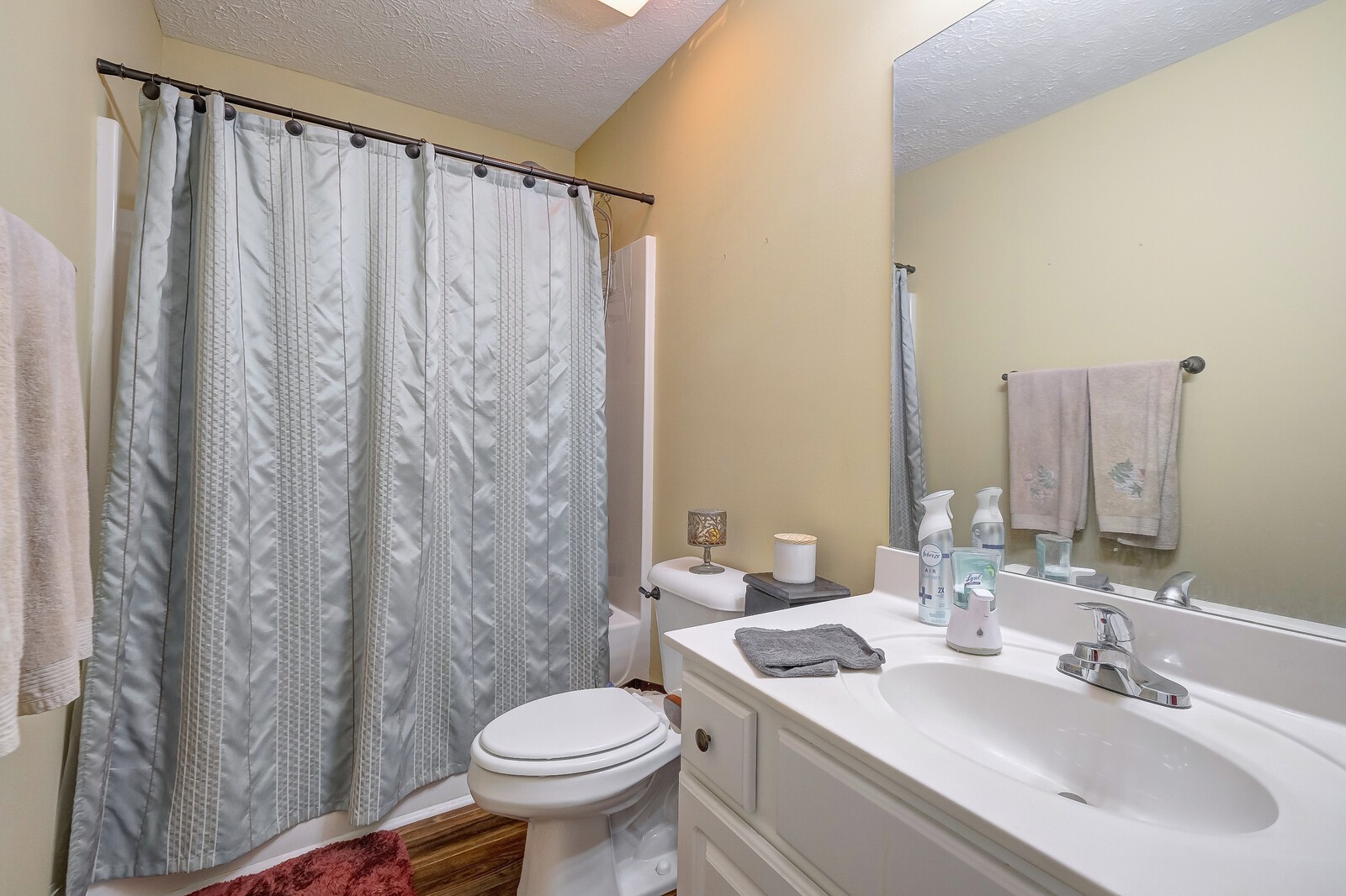 3904 Stephens Ridge Way Antioch, TN 37013 - Photo 9 of 17 a bathroom with a sink toilet and shower