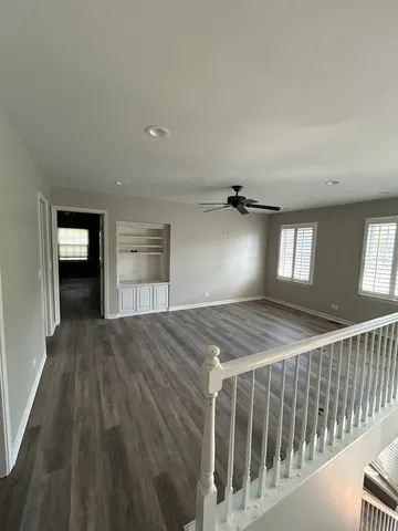 a bedroom with bed and window