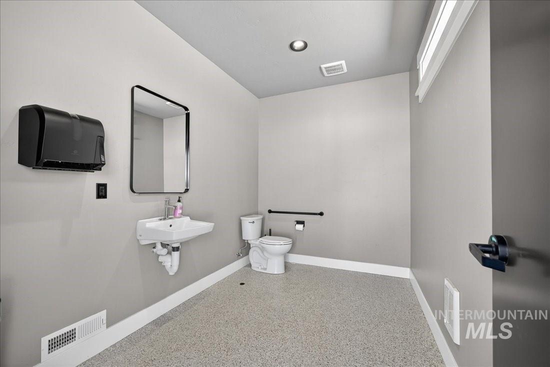 39 Sunbridge Drive McCall, ID 83638 - Photo 9 of 10 Half bathroom featuring speckle patterned floor and toilet