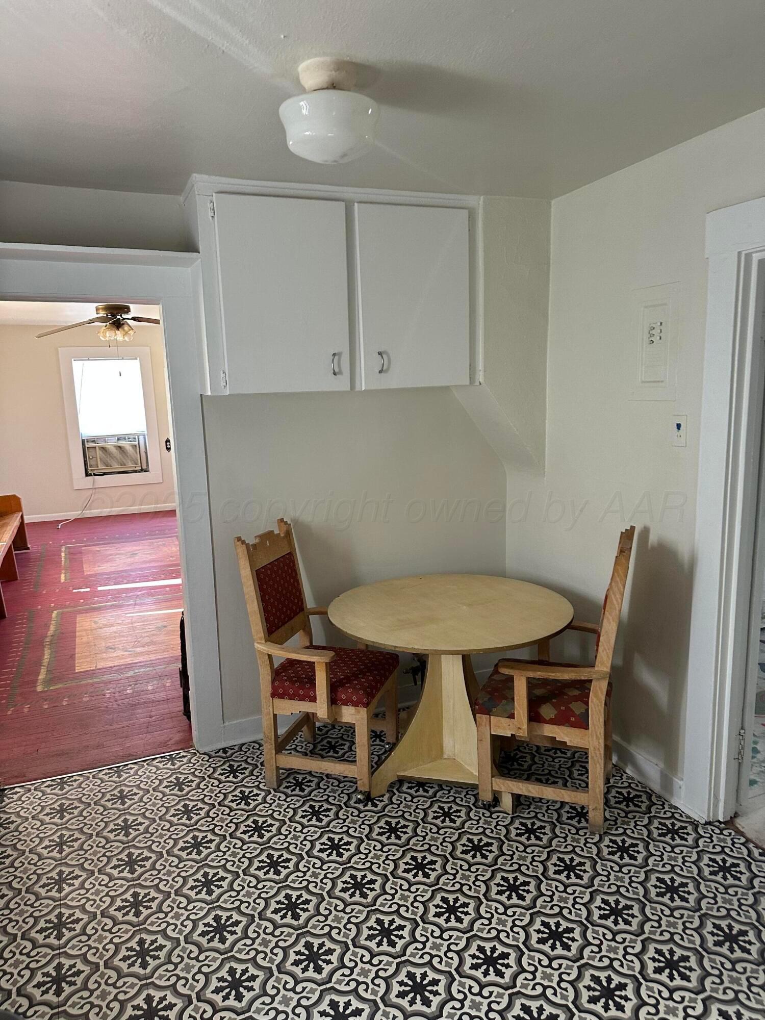 1021 Jackson Street Borger, TX 79007 - Photo 12 of 26 a view of a workspace with furniture