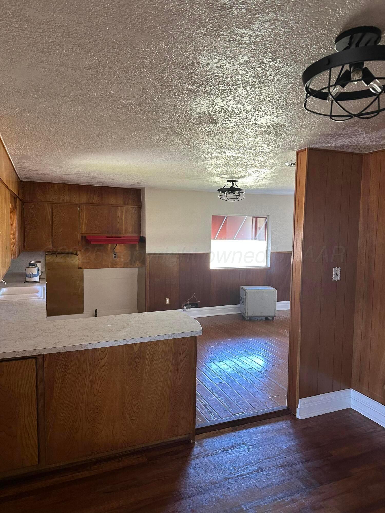 1021 Jackson Street Borger, TX 79007 - Photo 20 of 26 a view of living room with wooden floor