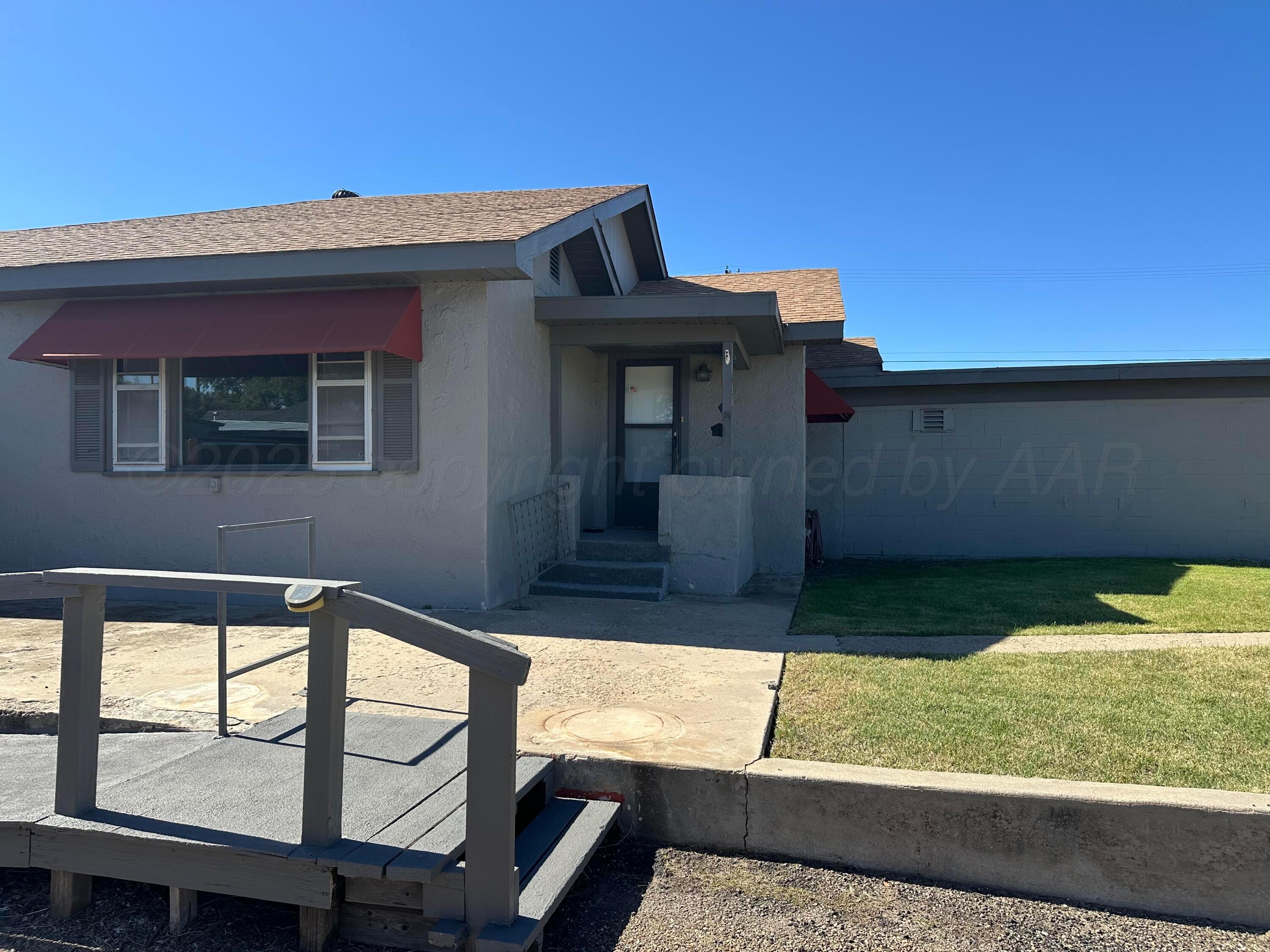 1021 Jackson Street Borger, TX 79007 - Photo 6 of 26 a view of a house with a porch