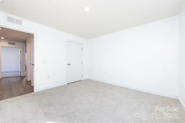 an empty room with an entryway
