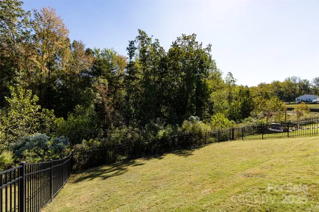 a view of a lake with a house