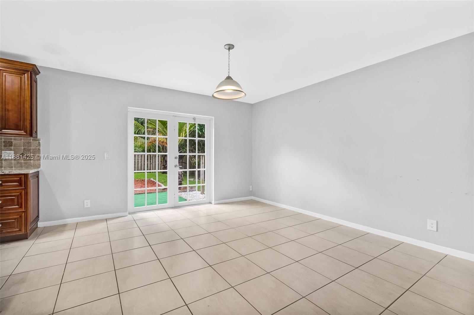 5119 Oak Hill Road Delray Beach, FL 33484 - Photo 15 of 48 a view of an empty room with a window