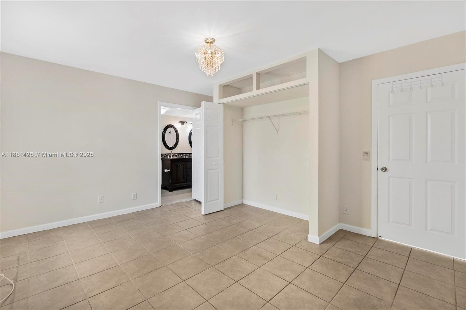 5119 Oak Hill Road Delray Beach, FL 33484 - Photo 21 of 48 a view of an empty room and fire place