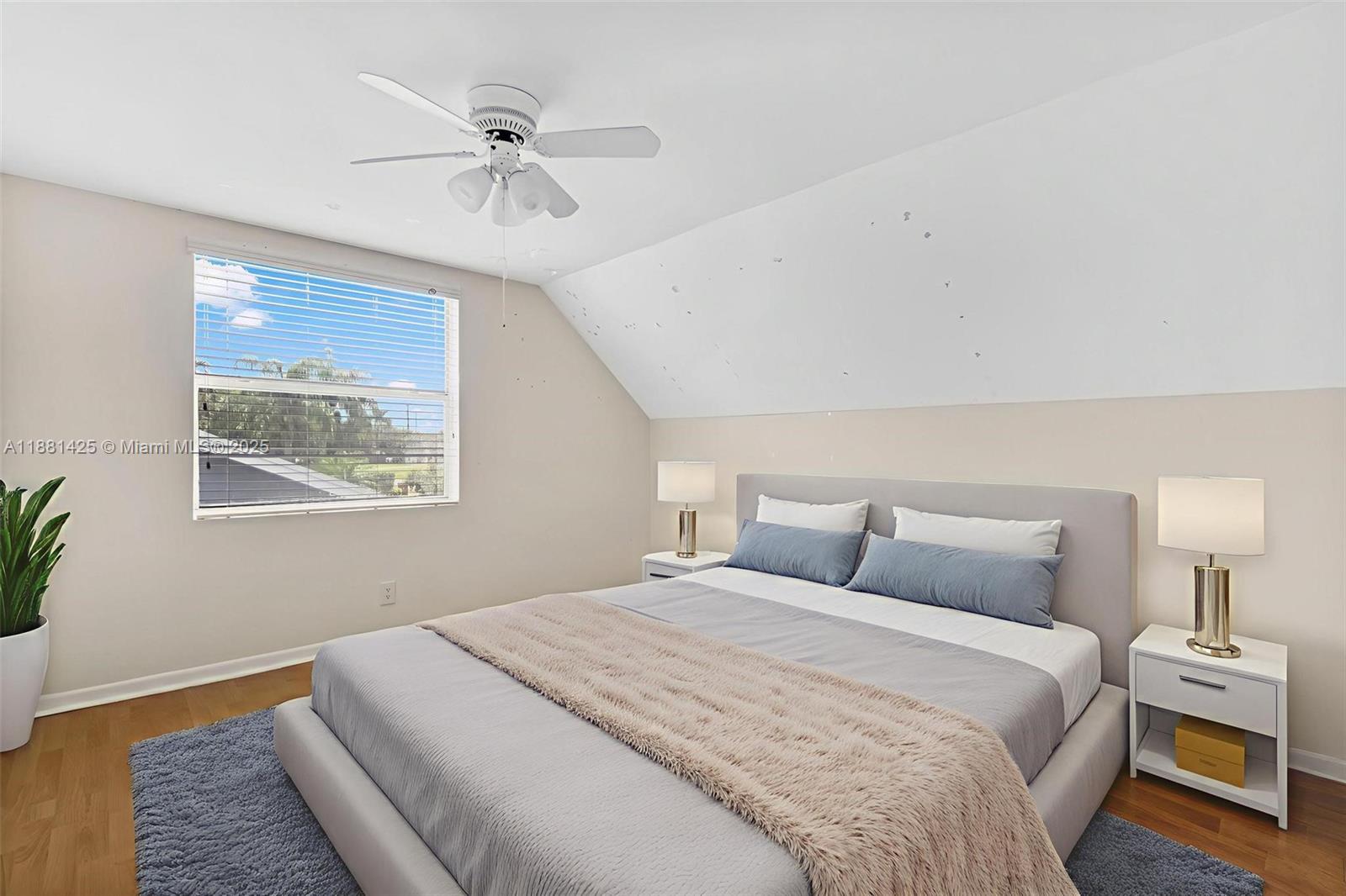 5119 Oak Hill Road Delray Beach, FL 33484 - Photo 26 of 48 a bedroom with a bed and a window