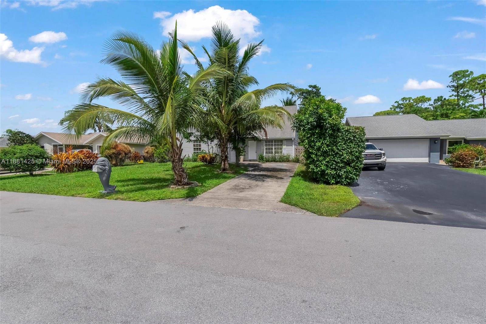 5119 Oak Hill Road Delray Beach, FL 33484 - Photo 45 of 48 a view of a garden with a apartment