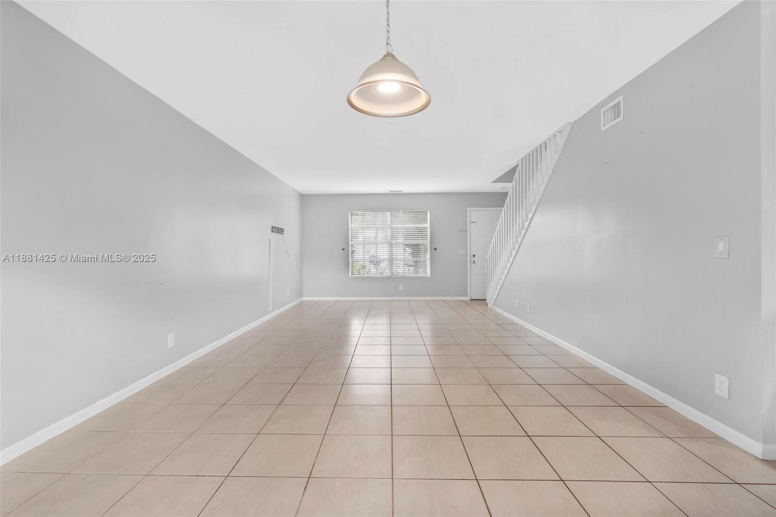5119 Oak Hill Road Delray Beach, FL 33484 - Photo 8 of 48 a view of an empty room and window