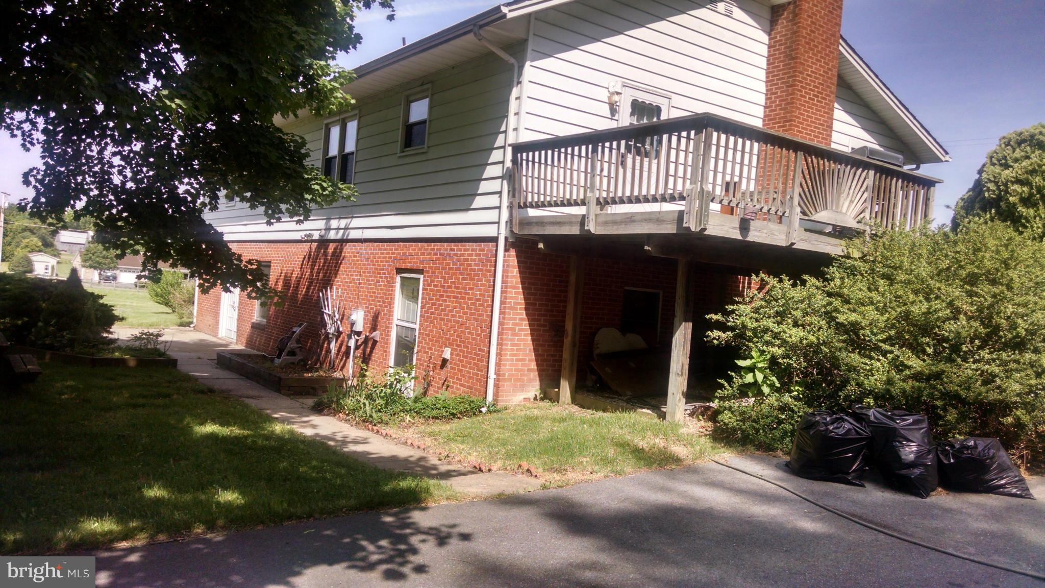 1091 Lower Pindell Road Lothian, MD 20711 - Photo 2 of 26 a view of a house with a yard