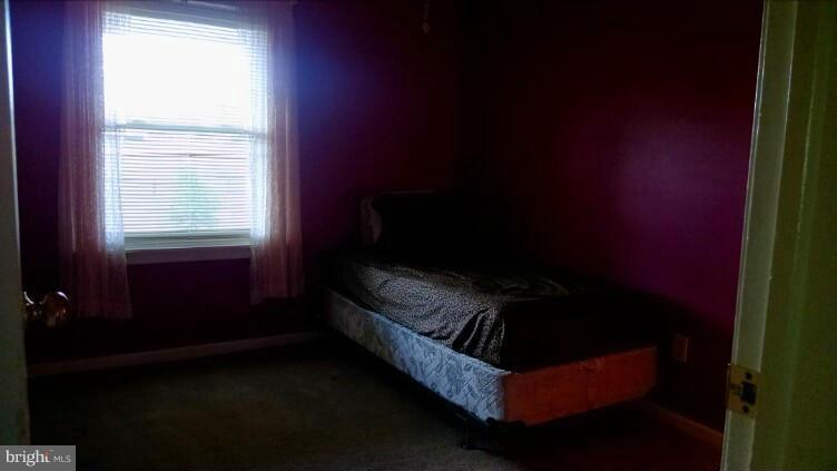 1091 Lower Pindell Road Lothian, MD 20711 - Photo 12 of 26 a view of wooden floor in a room