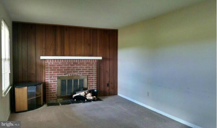 1091 Lower Pindell Road Lothian, MD 20711 - Photo 7 of 26 a view of an empty room and fire place
