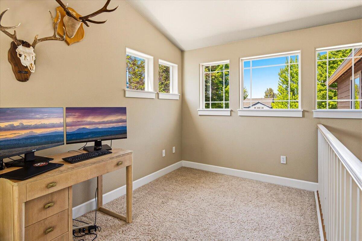 1339 Southwest Rimrock Way Redmond, OR 97756 - Photo 12 of 26 a room with furniture and window