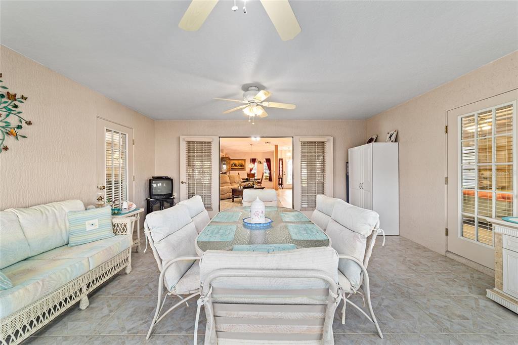 15680 Southwest 13th Circle Ocala, FL 34473 - Photo 44 of 74 a view of a dining room with furniture window and outside view
