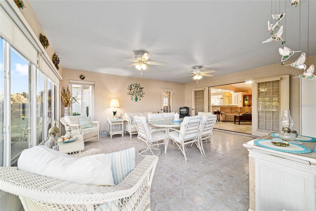 15680 Southwest 13th Circle Ocala, FL 34473 - Photo 46 of 75 a living room with furniture and a large window