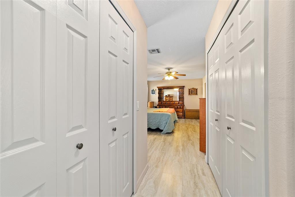 15680 Southwest 13th Circle Ocala, FL 34473 - Photo 46 of 74 a en suite bathroom with a sink a mirror and a shower