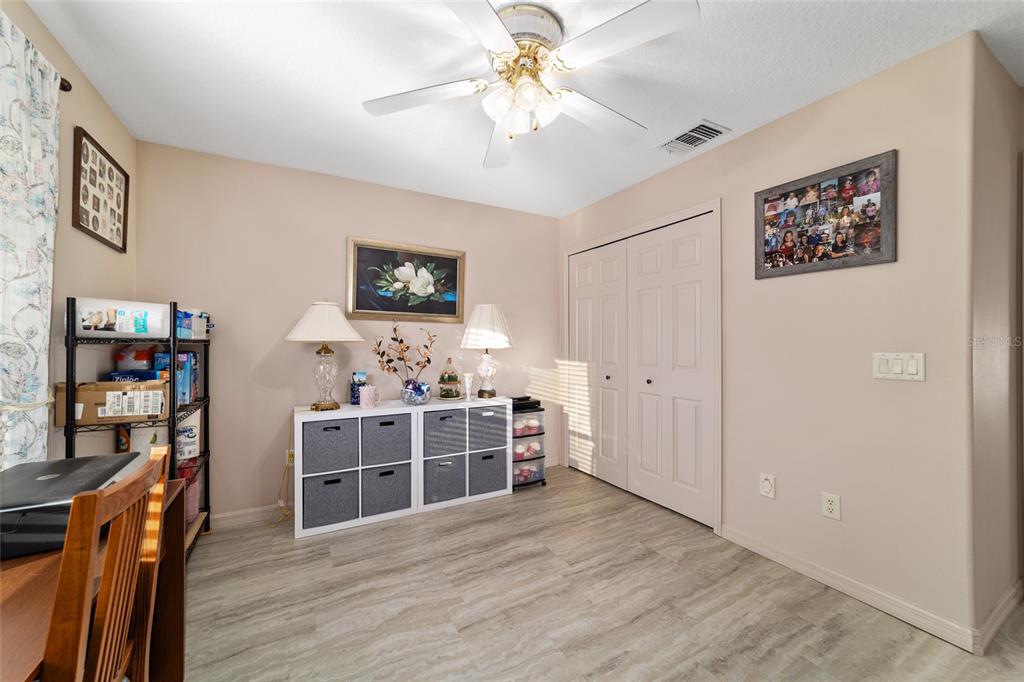 15680 Southwest 13th Circle Ocala, FL 34473 - Photo 63 of 75 a view of a livingroom with furniture and hardwood floor
