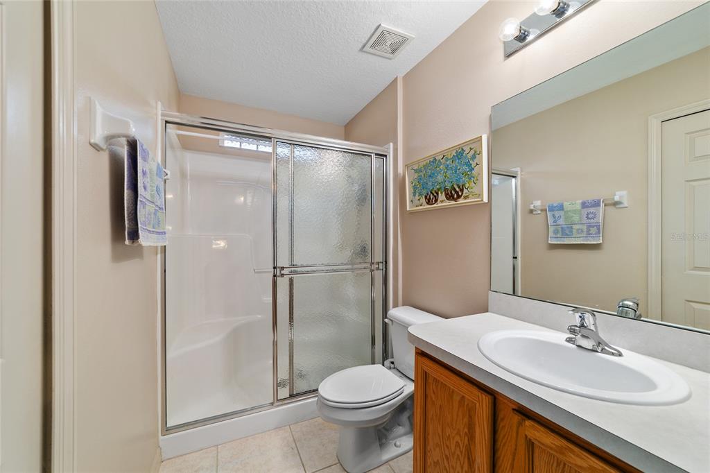 15680 Southwest 13th Circle Ocala, FL 34473 - Photo 64 of 75 a bathroom with a sink toilet and shower