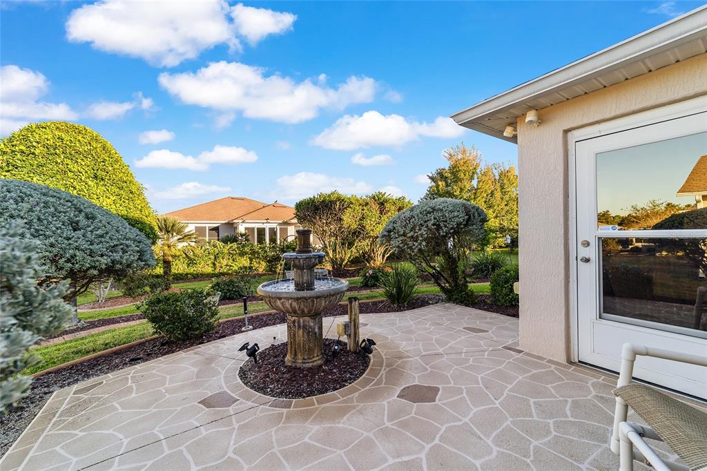 15680 Southwest 13th Circle Ocala, FL 34473 - Photo 65 of 74 a view of a house with backyard and sitting area