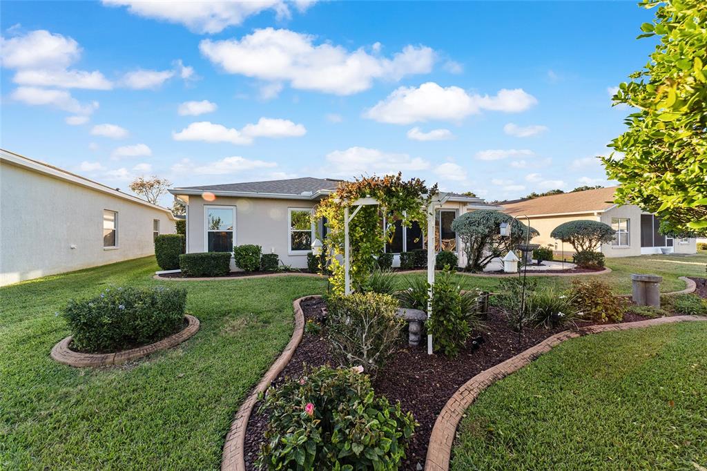 15680 Southwest 13th Circle Ocala, FL 34473 - Photo 69 of 74 a view of a back yard of the house