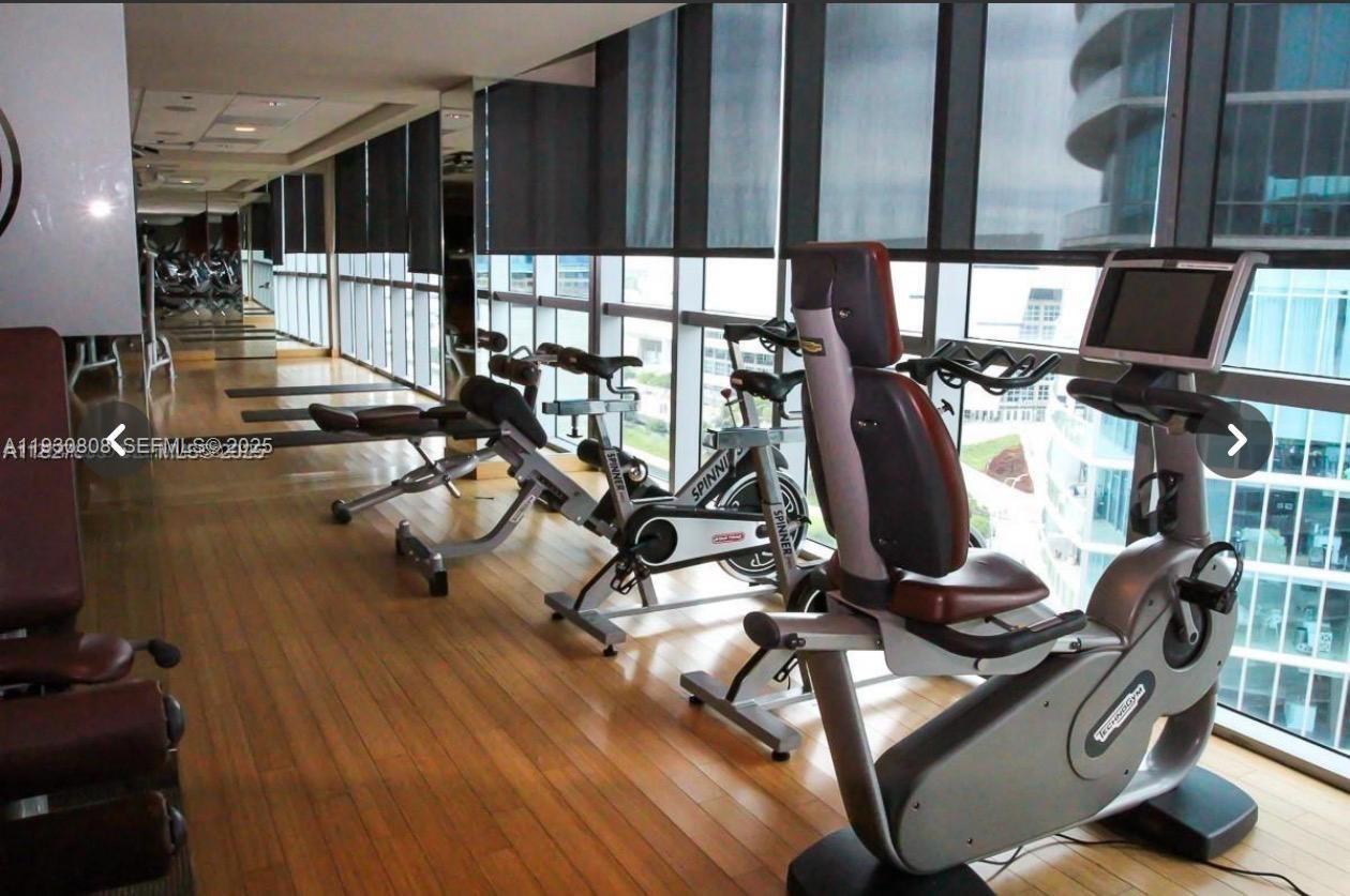 900 Biscayne Boulevard, Unit 3704 Miami, FL 33132 - Photo 12 of 20 a view of a room with gym equipment