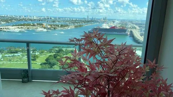 a view of a lake with a city