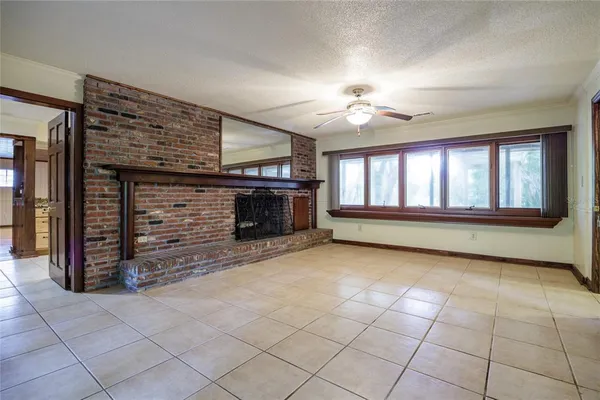 a kitchen with a stove a sink and a refrigerator