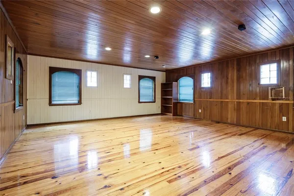 a bathroom with a sink a mirror and a toilet