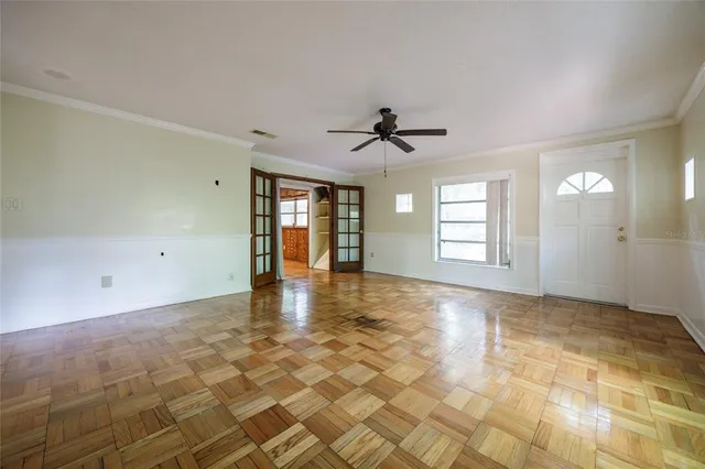 a view of an empty room with a window