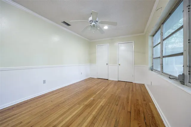 a view of backyard with cabin