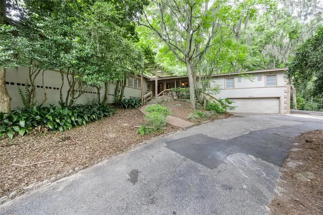 a view of an empty room with windows