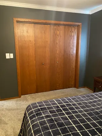 a bedroom with a bed