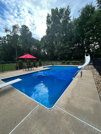a view of an outdoor space and swimming pool