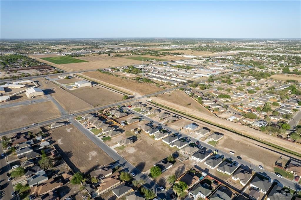 427 Serg Loop Alamo, TX 78516 - Photo 8 of 8 Aerial view of property and surrounding area featuring nearby suburban area